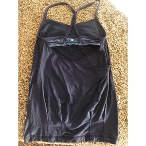 Lululemon 6 Navy Blue with attached sports bra.